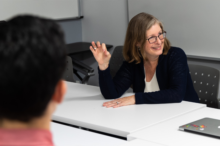 professor speaking with students