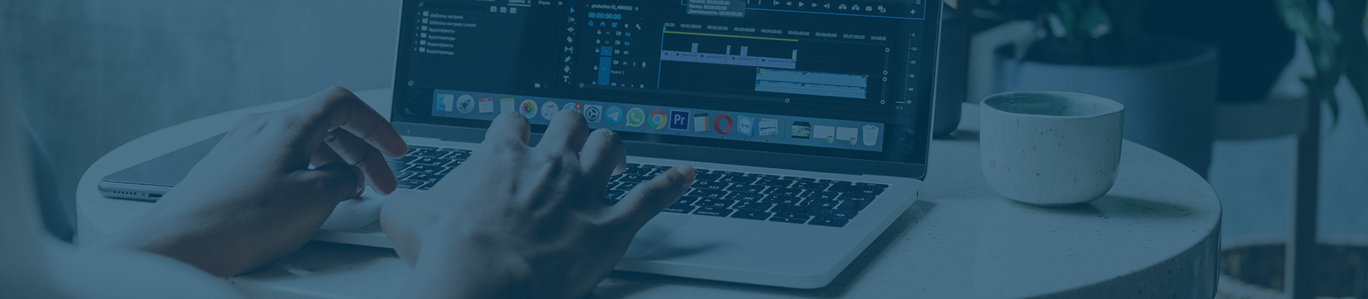 user typing on laptop